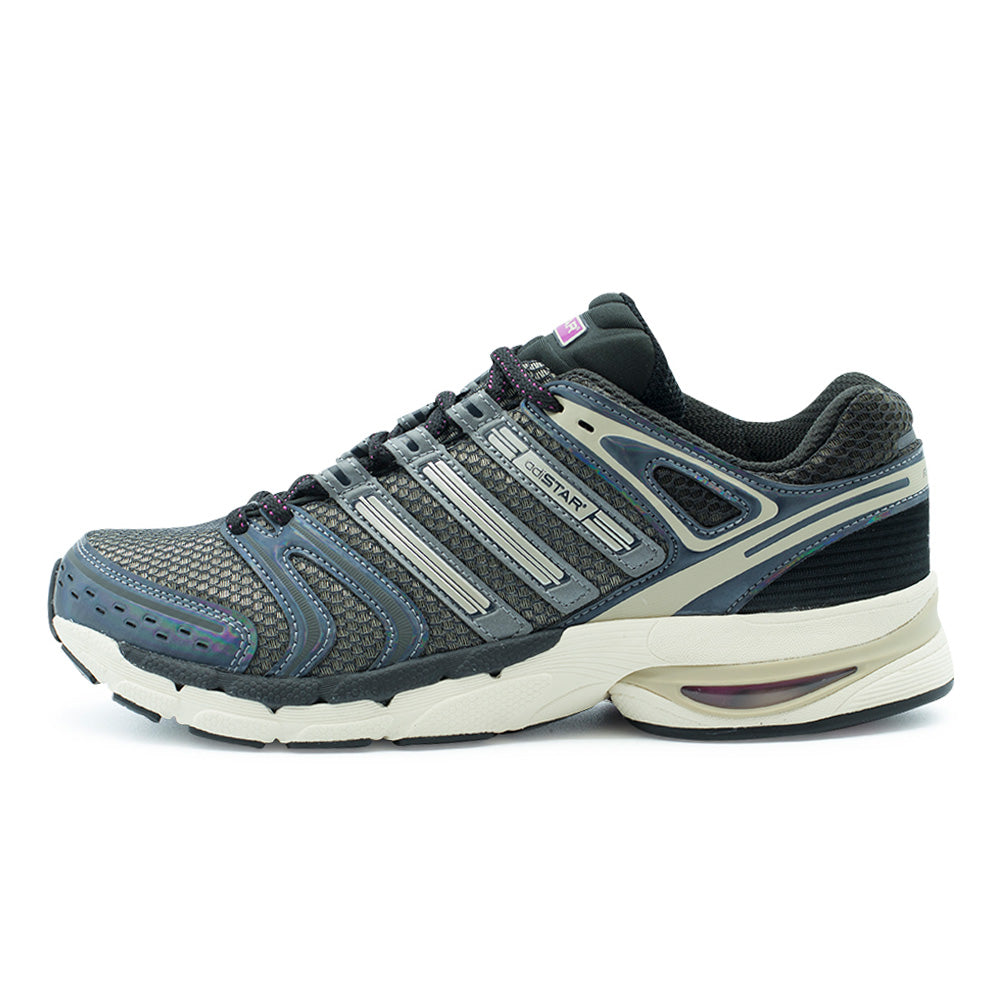 Lateral profile studio view of the adidas Adistar Control 5 shoe in Core Black, Khaki Three, and Semi Lucid Fuchsia, showcasing a technical 2000s running silhouette with grey open-mesh base, iridescent grey-blue synthetic overlays, silver Three Stripes midfoot cage with an integrated adiSTAR logo badge, an external heel counter, and a sculpted cream foam midsole featuring a visible fuchsia cushioning pod insert.