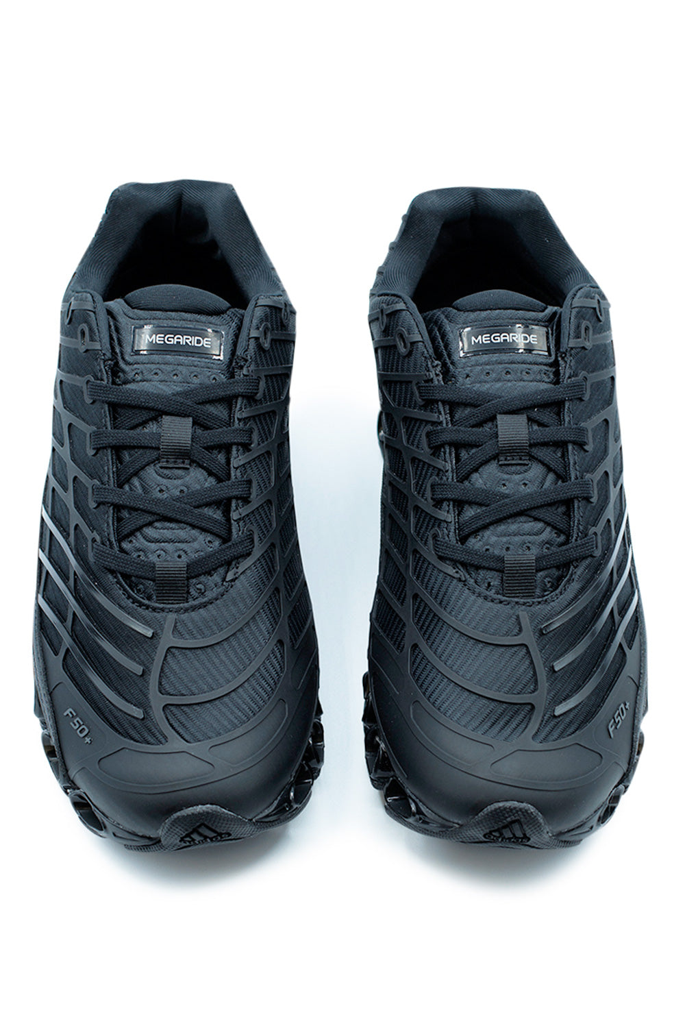 Top view of Adidas Megaride F50 Core Black featuring breathable mesh upper, lace-up closure, padded tongue, and football-inspired F50 framework for modern streetwear wear