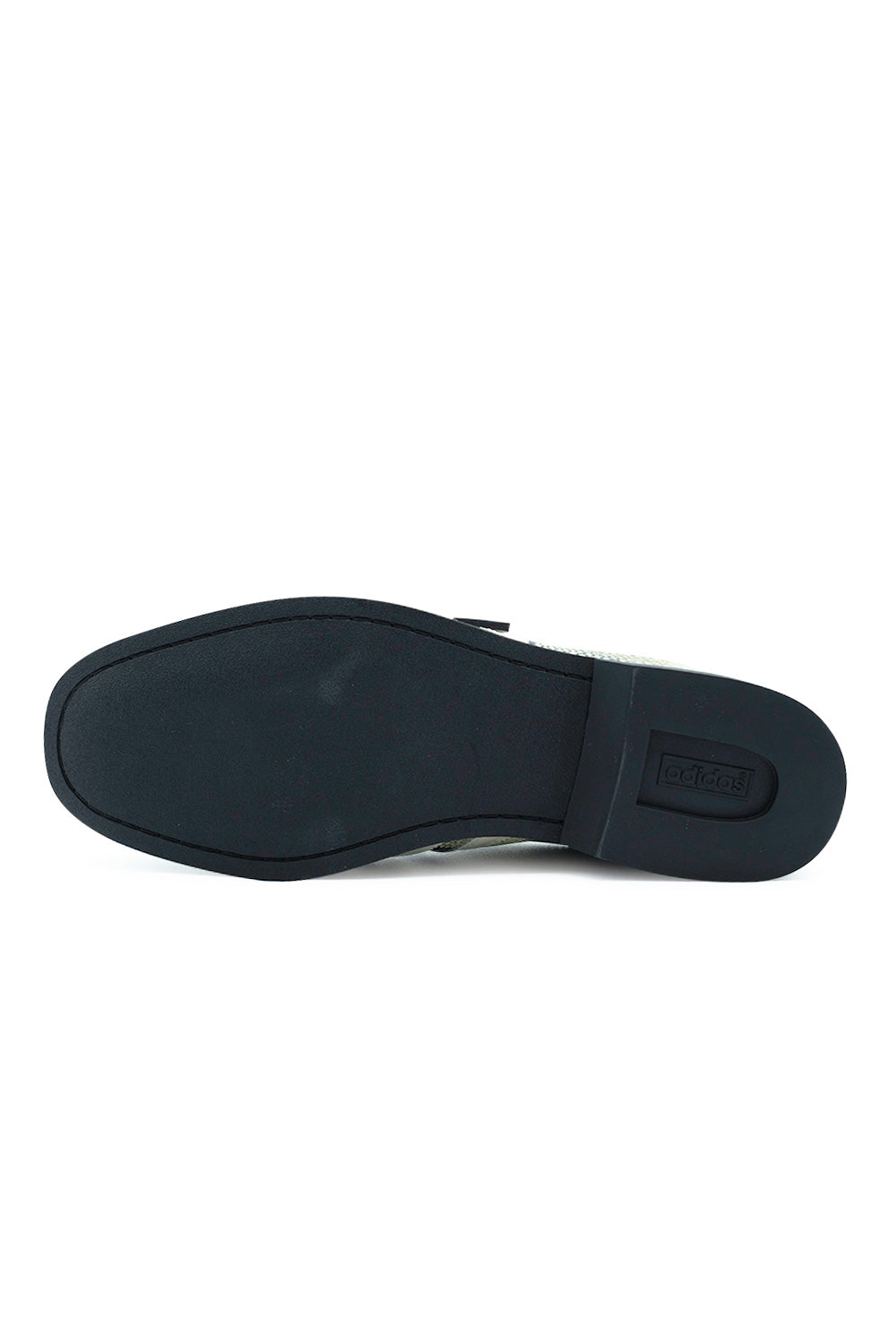 Full bottom view of the smooth black rubber outsole on the Adidas X Brain Dead Bowling shoe, displaying the stitched perimeter forefoot and the separate raised block heel featuring an inset Adidas Trefoil logo window.