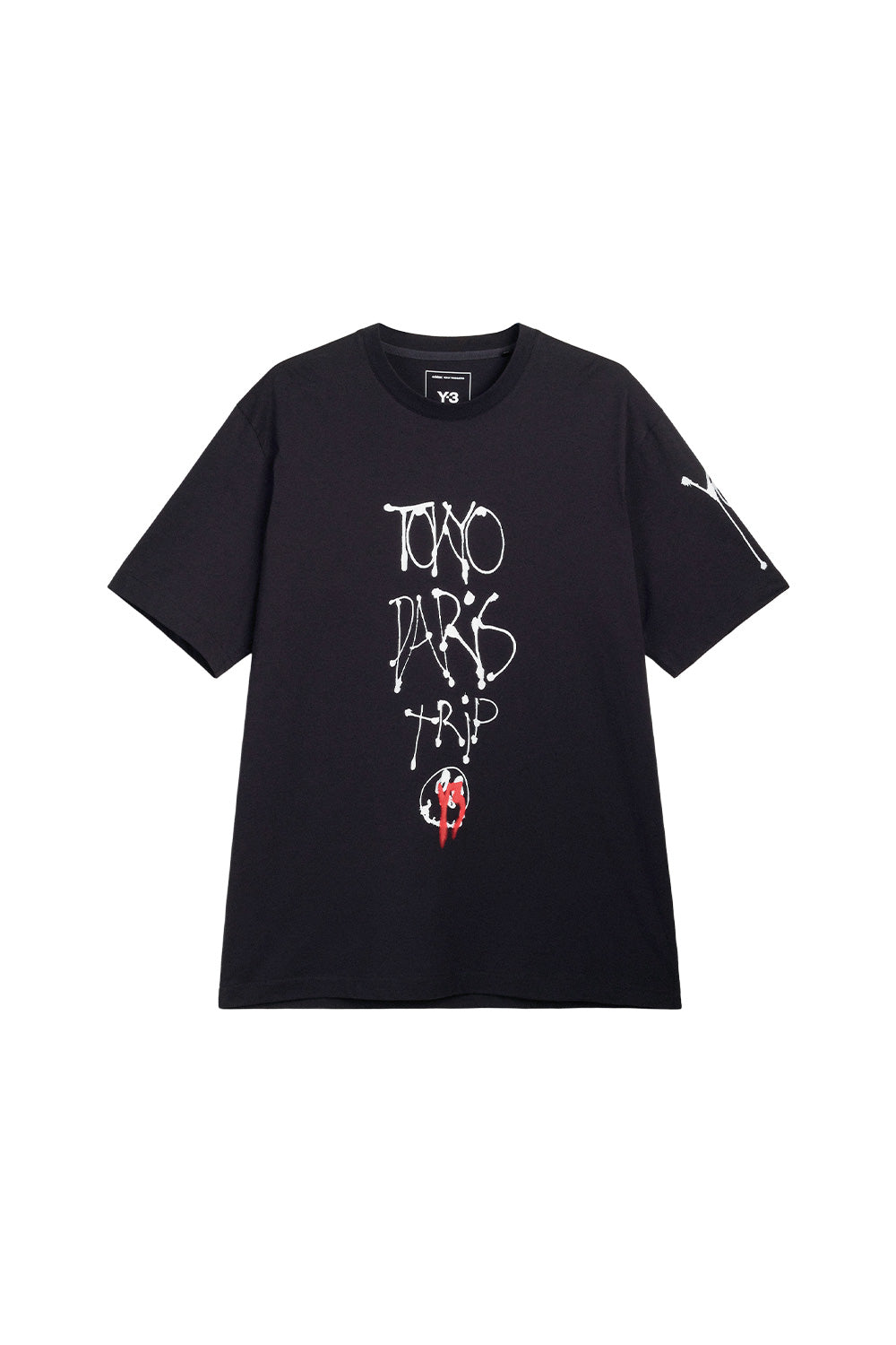 Front view of the black Adidas Y-3 X Chito City Graphic Short Sleeve Tee, crafted from premium cotton jersey with vertical white dripping tag lettering reading TOKYO PARIS TRIP, a small circular face with red spray paint overlay, and a white graffiti tag printed on the left sleeve.