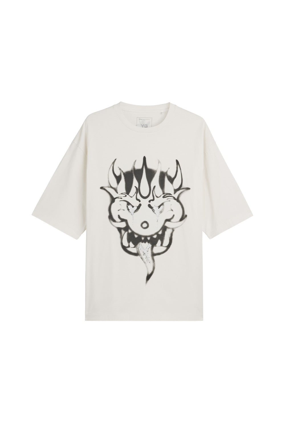 Front view of the limited Adidas Y-3 x Chito GFX Graphic Short Sleeve Tee in chalk white cotton jersey, showcasing a loose boxy fit and a large black airbrushed horned monster face with silver metallic details on the chest.