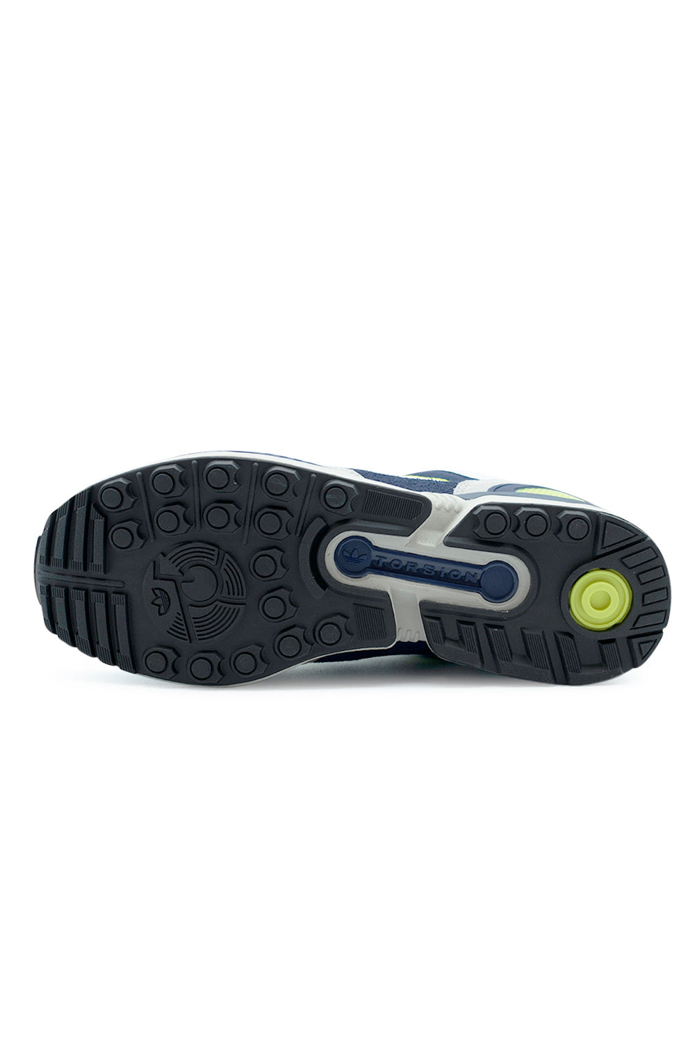 Adidas ZX 8000 outsole close-up displaying rugged rubber traction pattern with Torsion System support plate engineered for grip, durability and performance on urban surfaces