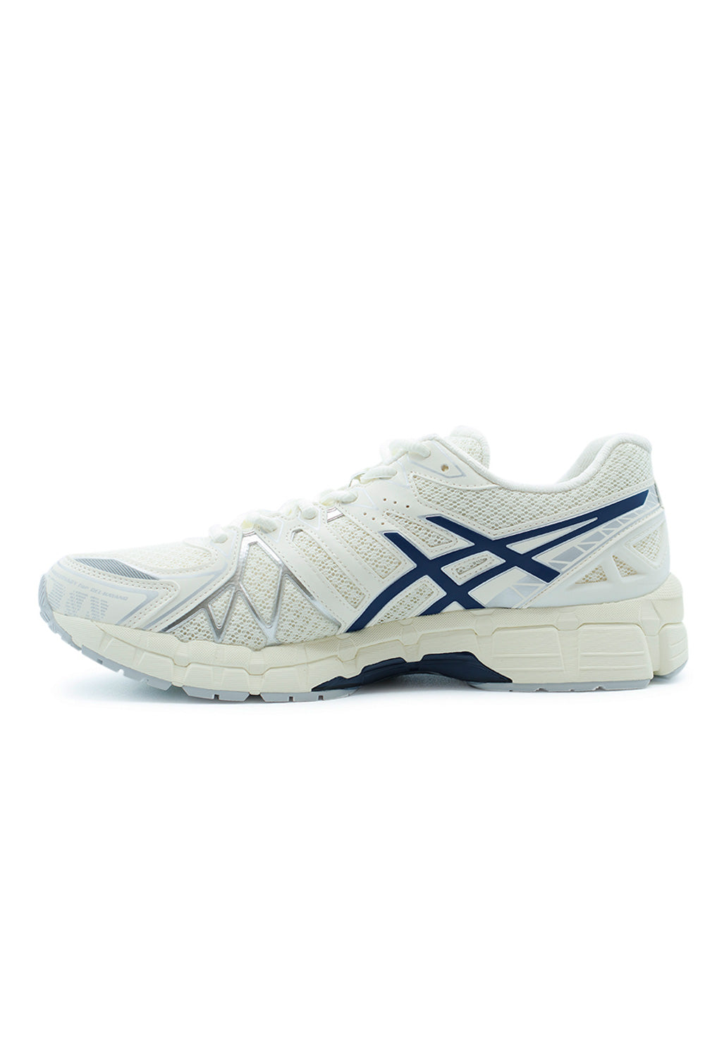 Lateral profile of ASICS GEL-Kayano 20 Cream Independence Blue athletic sneaker displaying signature ASICS stripe branding, structured stability midsole and retro performance running aesthetic.