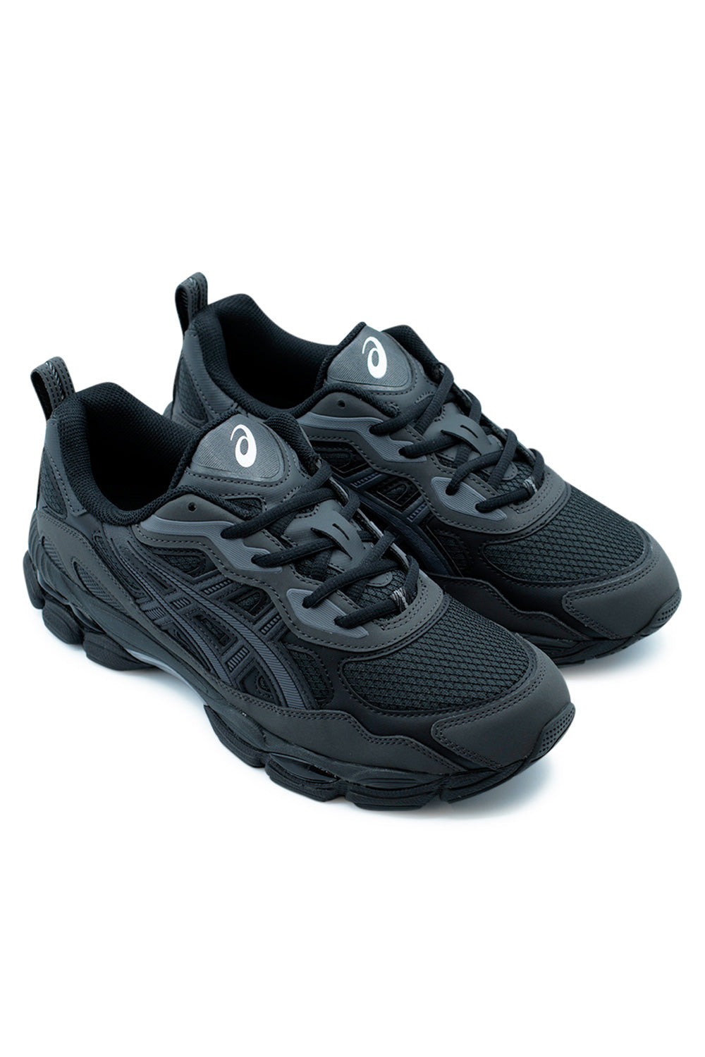 Asics GEL-NYC RGD Black/Graphite Grey sneakers in angled front view displaying the multi-layer upper construction, mesh underlays, tonal overlays and GEL-CUMULUS 16 cushioning tooling.