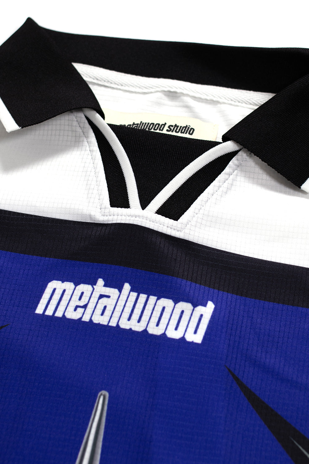 Metalwood Studio X-Games LS Jersey – Leichtes, bequemes Polyester-Jersey mit elastischem Kragen, perfekt für sportliche Aktivitäten und Freizeit.