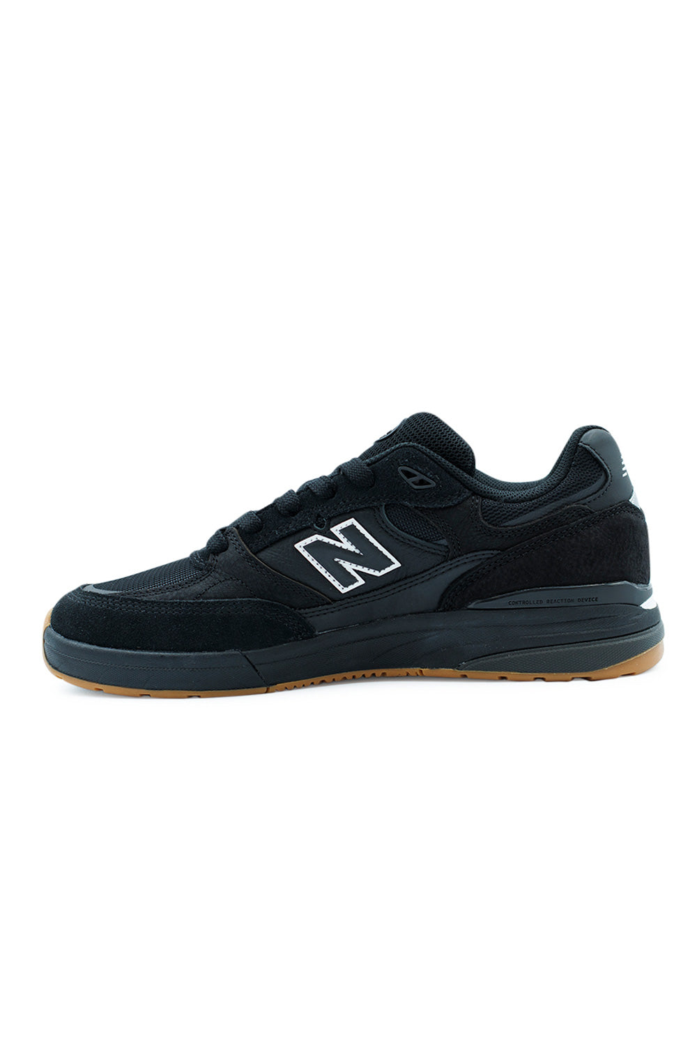 High-performance New Balance Numeric 933 Andrew Reynolds Black signature skate shoe with suede, leather, mesh, and TPU mid-foot shank.