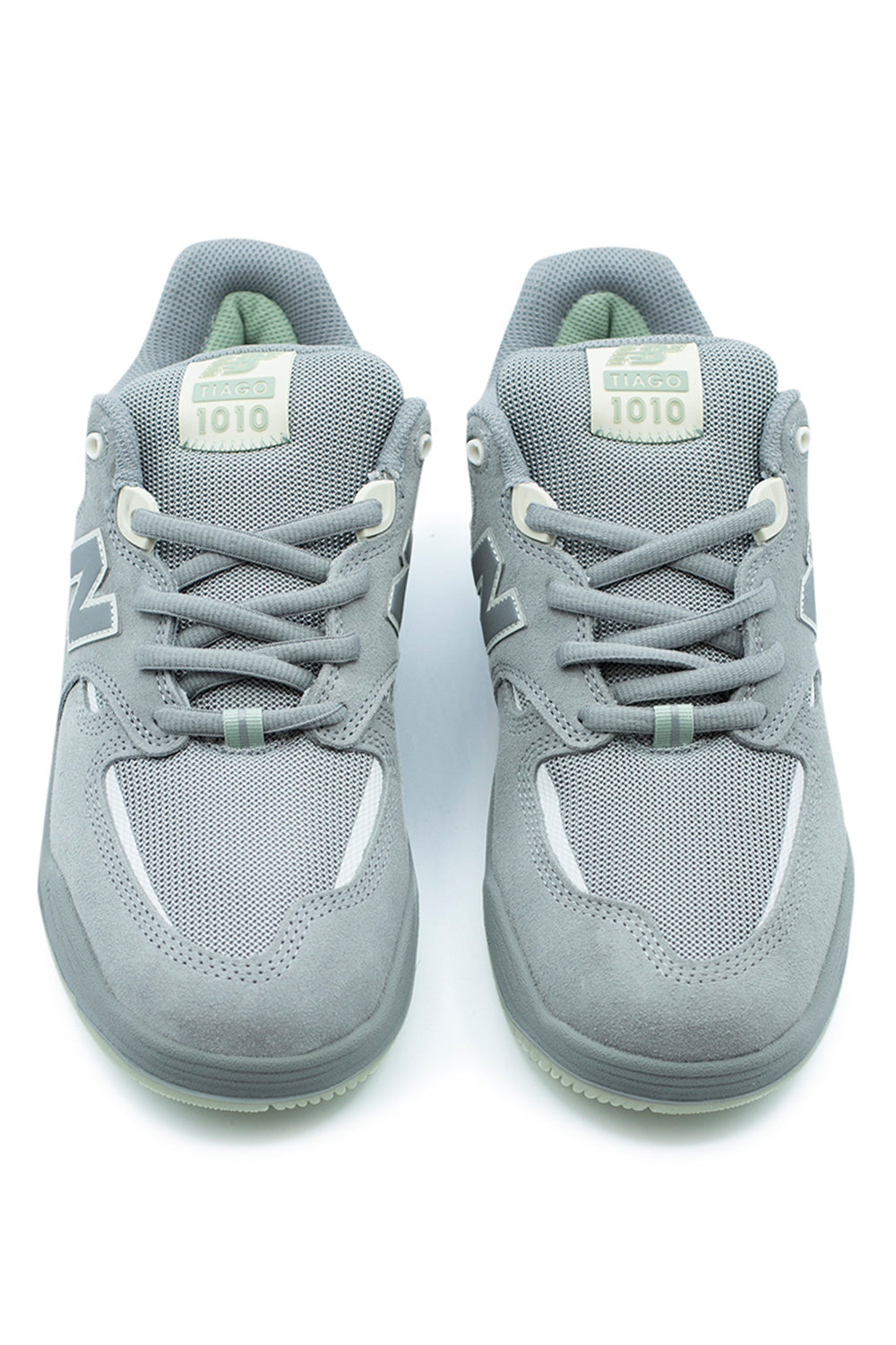top-down view of Tiago Lemos NB Numeric 1010 skate shoe highlighting breathable forefoot mesh, cushioned tongue branding and secure lace closure for precise board control