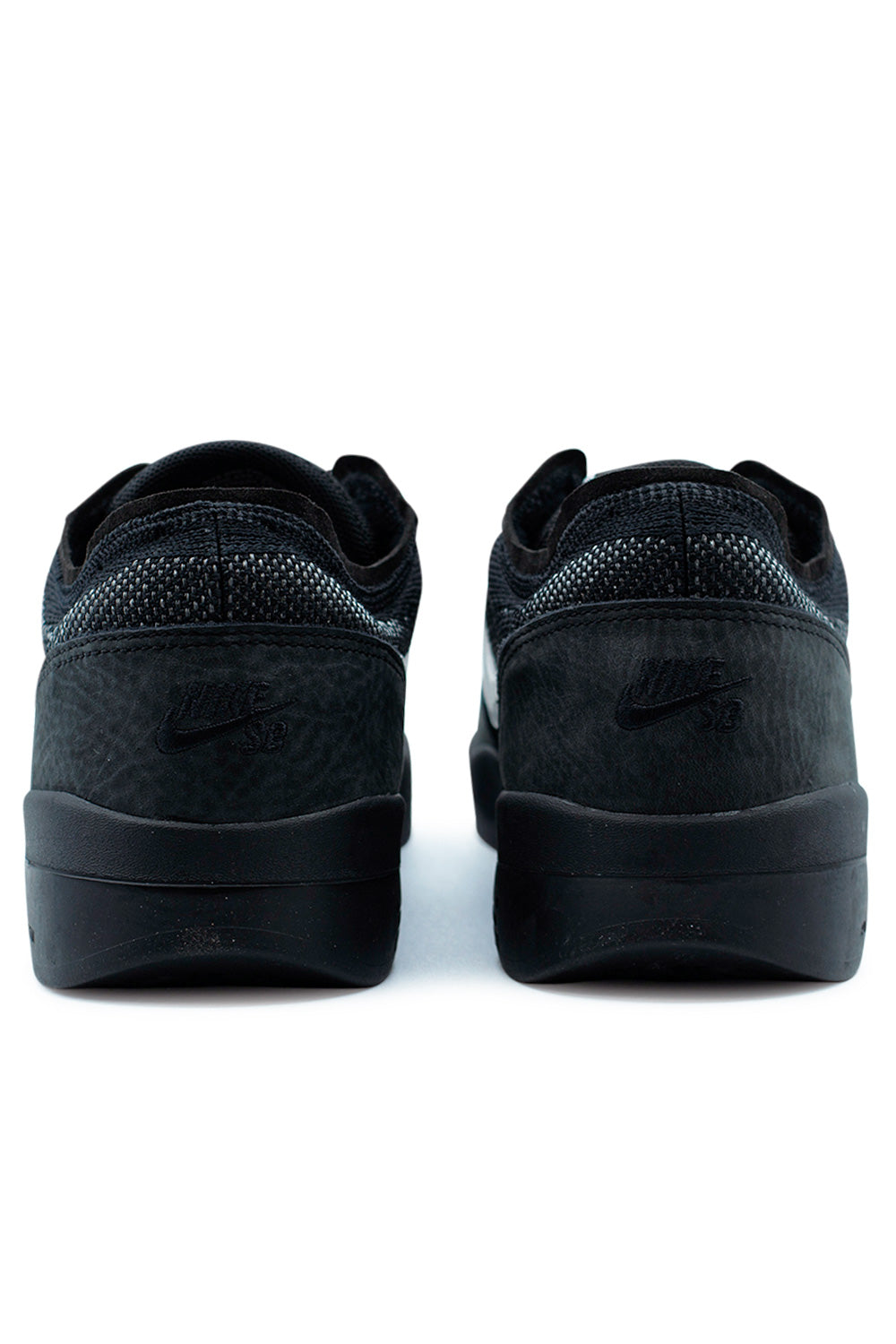 Rear view of Nike SB PS8 Black skate shoe highlighting durable heel construction, Nike SB branding and running-inspired silhouette for modern skateboarding