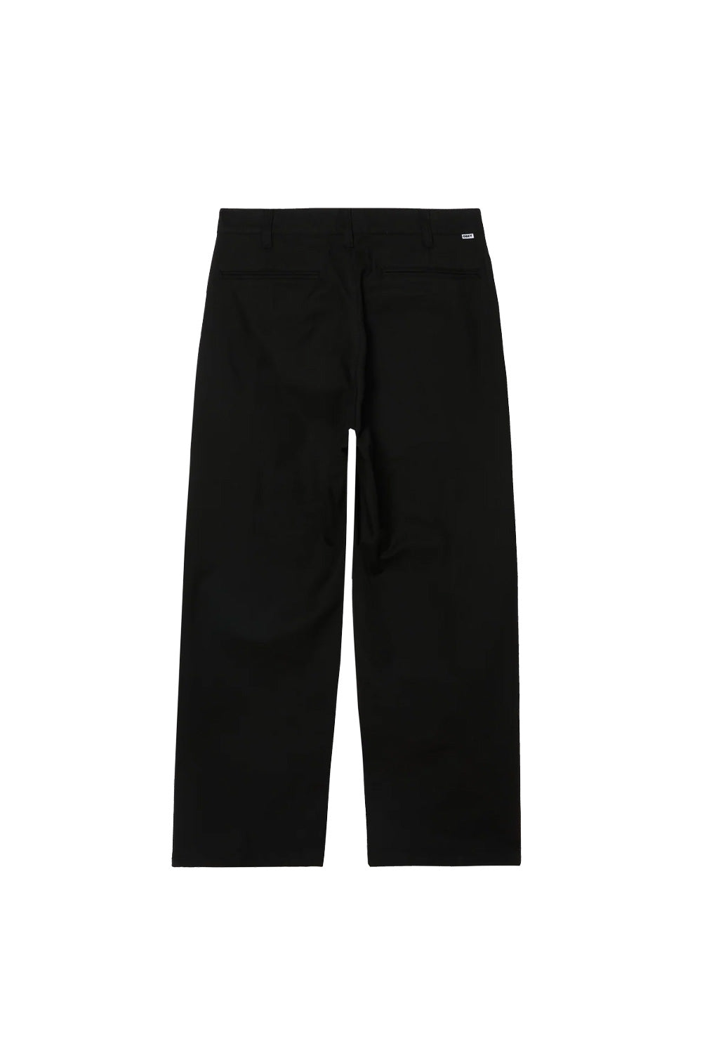 Rear flat lay view of the Obey Dean Pleated Pant in black, highlighting the straight leg cut, belt loops across the tailored waistband, two clean horizontal back welt pockets, and a white woven Obey flag label above the right pocket.