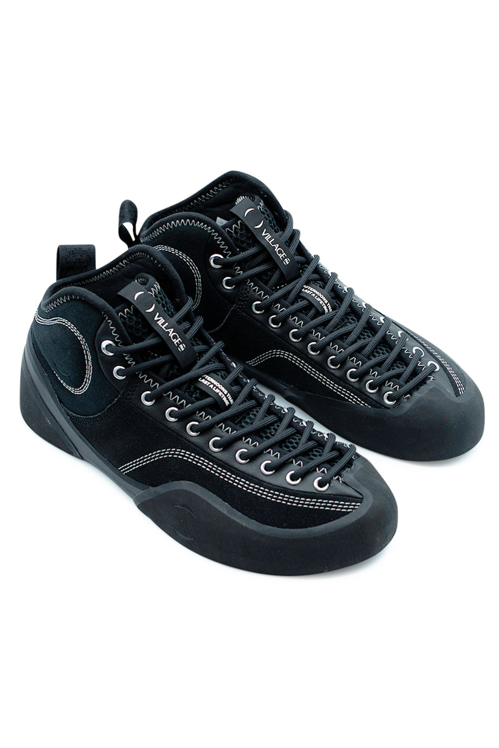 Village PM 1PM Mid Black Natural Black performance skateboard shoes angled pair view highlighting climbing rubber rand protection, suede construction and modern technical skate silhouette
