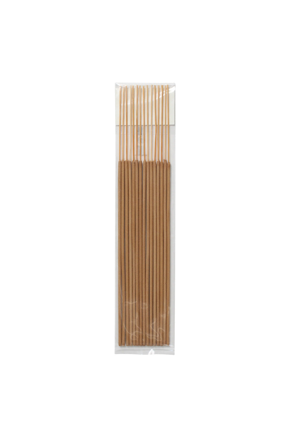 A pack of fifteen premium brown Wacko Maria x Kuumba Rock Steady incense sticks neatly arranged inside a transparent protective plastic wrapper.