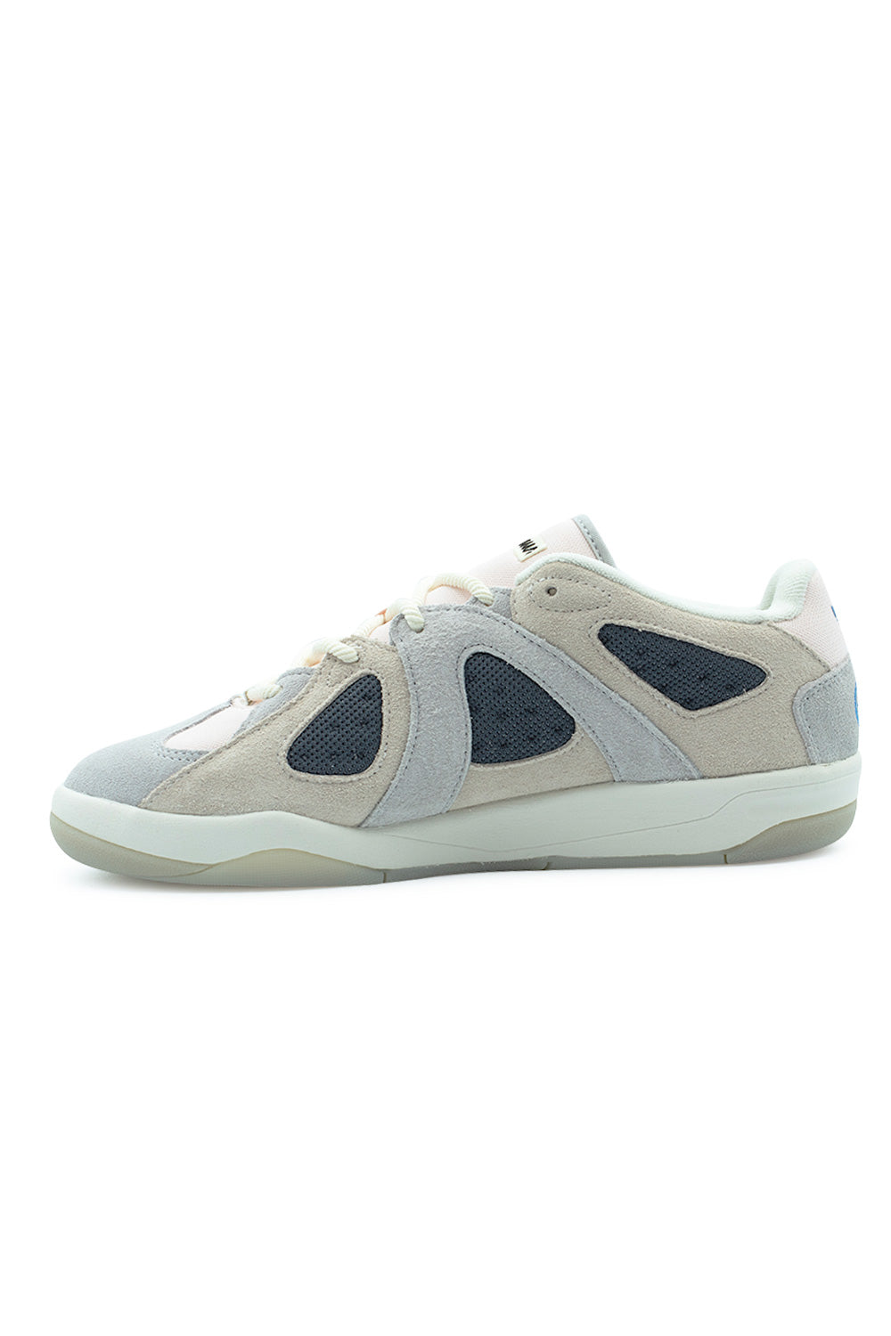 Medial arch profile view of the Adidas Bad Bo 1.1 sneaker, illustrating the inner light grey and chalk white suede paneling, dark perforated mesh ventilation windows, padded collar, and low-profile wrap-around cupsole construction