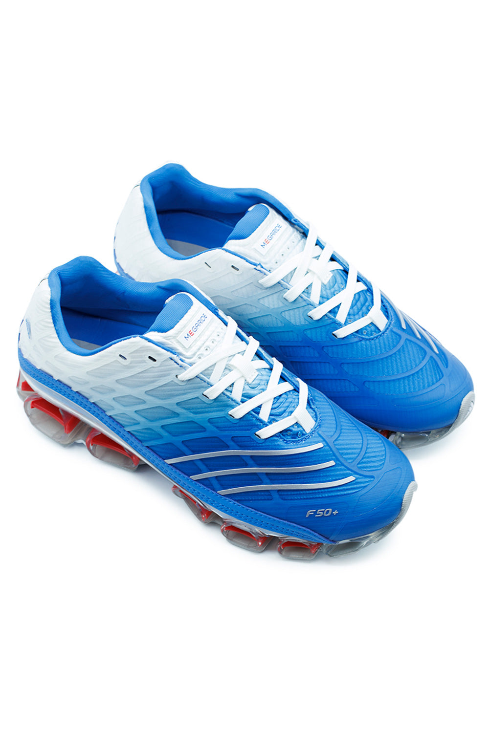 Adidas Megaride F50 sneakers photographed at an angle, combining retro football boot inspiration with futuristic running technology and street-ready Megaride sole system