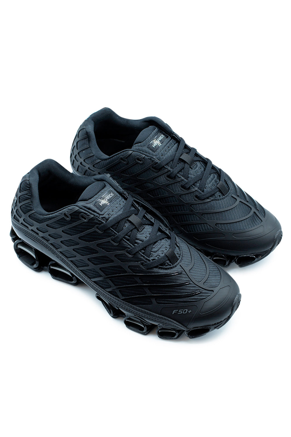 Angled view of Adidas Megaride F50 Core Black lifestyle sneakers combining football heritage, futuristic running technology, and bold all-black streetwear aesthetics