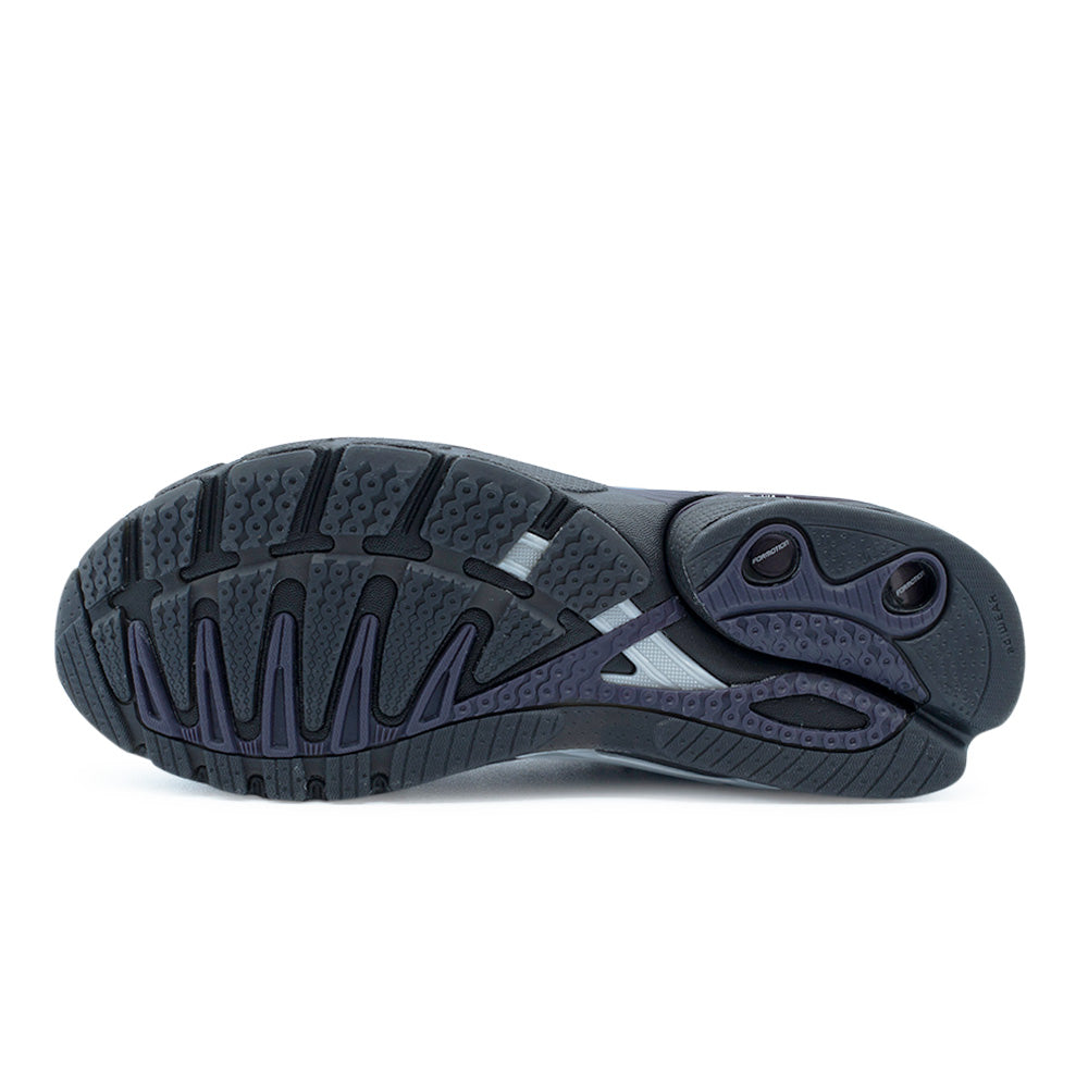 Bottom sole view of the Adidas X Hardies Adistar Control 5, showing the rugged multi-surface black and purple rubber traction pattern, decoupled heel pod with ForMotion technology, and integrated midfoot Torsion shank system.