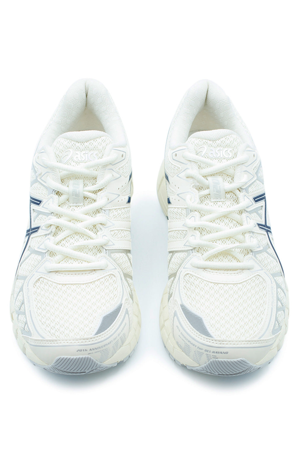 Front view of ASICS GEL-Kayano 20 trainers in Cream and Independence Blue featuring structured lacing system, ventilated mesh toe box, stability running shoe construction and technical heritage styling.