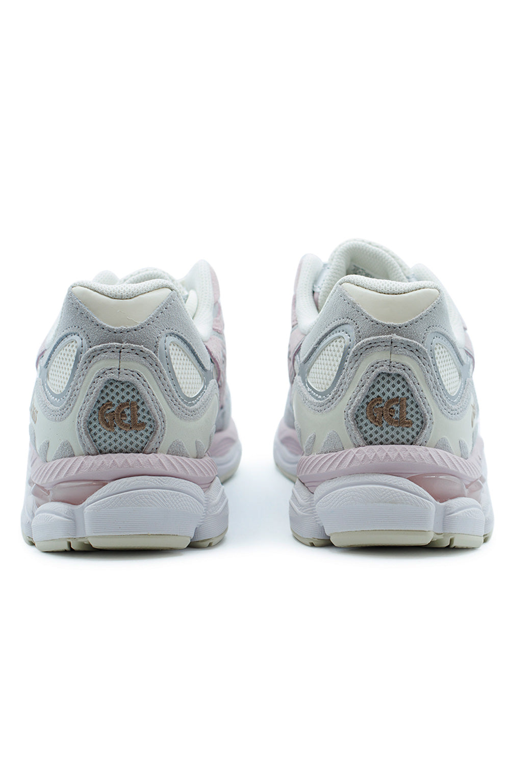Rear angle of ASICS GEL-NYC trainers highlighting GEL cushioning midsole, structured heel support, durable outsole grip pattern, and classic performance running shoe aesthetics.