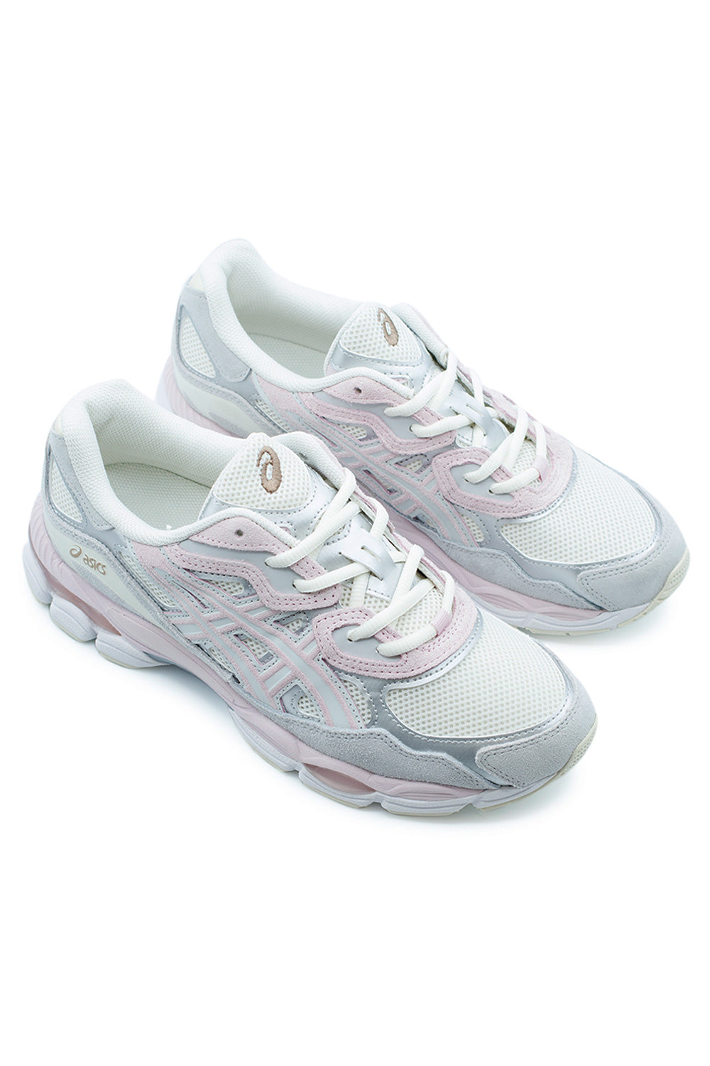 Three-quarter perspective of ASICS GEL-NYC lifestyle sneaker in Concrete Barely Rose colorway with layered suede panels, breathable mesh inserts, and modern comfort technology.