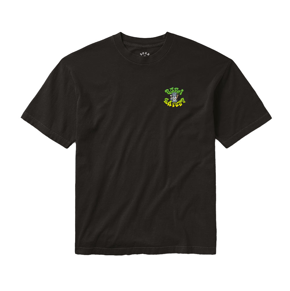Front flat lay studio perspective of the black Born X Raised Puppy T-Shirt, showcasing the seamless crewneck collar with printed interior brand details, wide short sleeves, and a scaled-down chest print of the cartoon puppy with neon yellow and green graffiti "BORN RAISED" rocker typography positioned on the left breast.