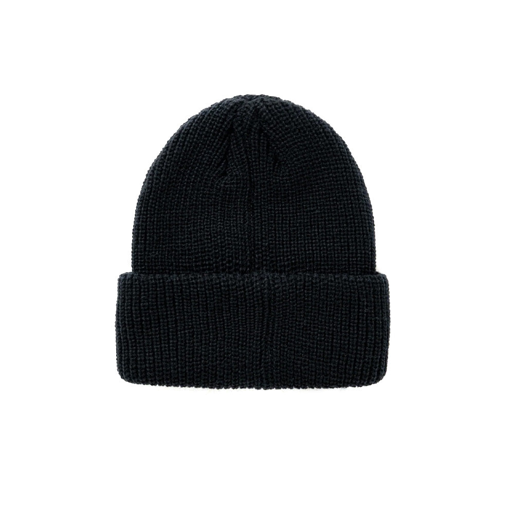Back flat lay studio perspective of the black BoTT Bones Cuff Beanie, highlighting the thick textured vertical rib knit construction, clean fold-over cuff edge, and four-point darted crown shaping.