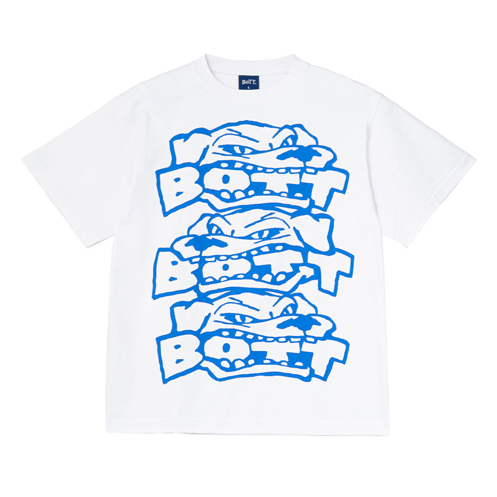 Front flat lay studio view of the BoTT Bottweiler T-Shirt in solid white, displaying a relaxed boxy skateboarder silhouette in heavy cotton jersey, ribbed crew neckline with a blue woven BoTT neck label, and a massive vibrant cobalt blue screen print featuring a vertical stack of three aggressive cartoon rottweiler faces biting down on block "BoTT" logo typography.
