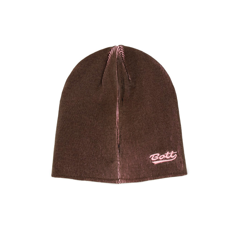 Front flat lay studio view of the BoTT Overprint Skullcap Beanie in deep chocolate brown, showcasing a cuffless close-fitting knit skull cap silhouette with subtle pastel pink contrasting under-yarn visible along the vertical rib structure and top crown seams, finished with a light pink embroidered cursive "BoTT" script logo on the lower right edge.