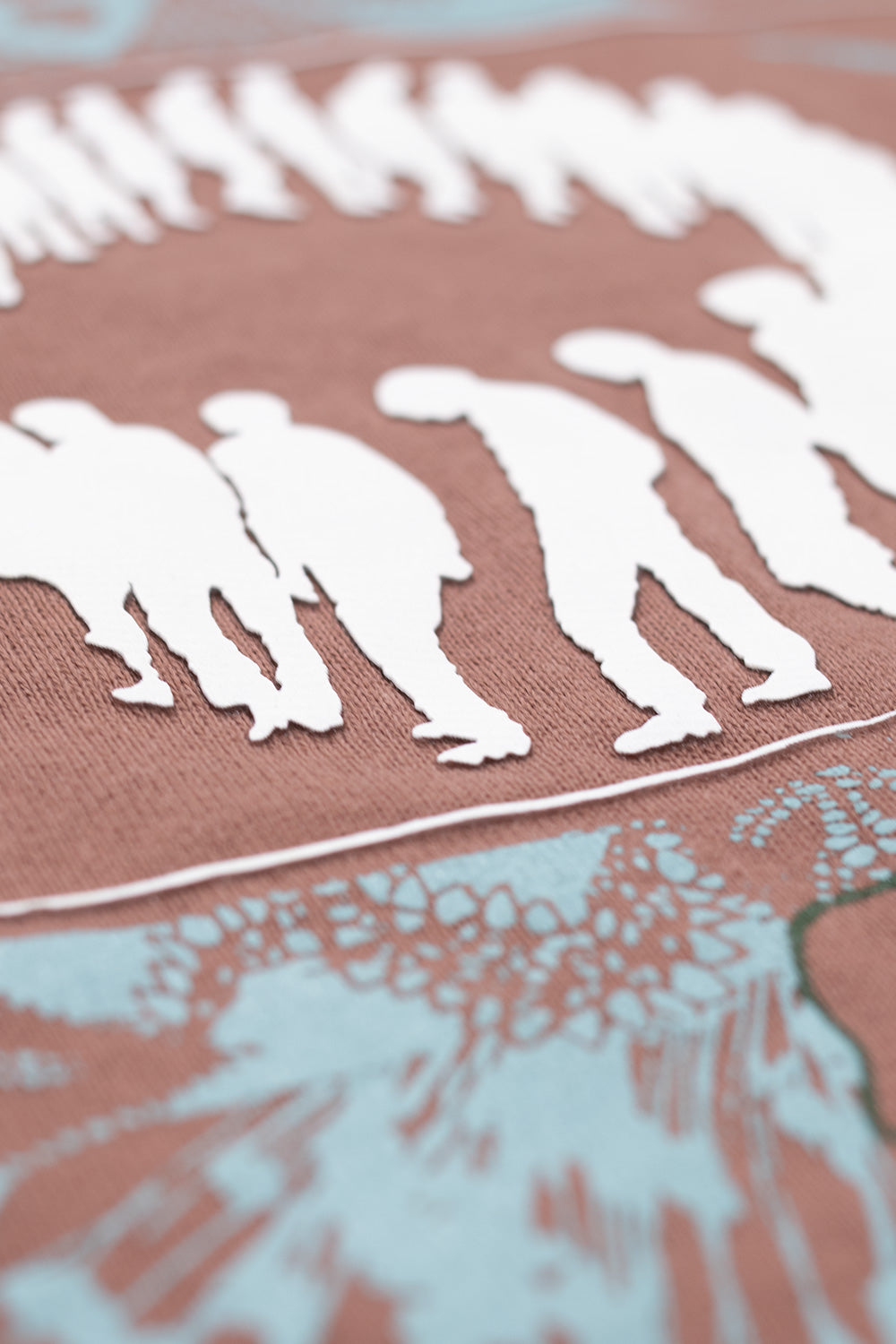 High-quality Brain Dead Endless Construction T-Shirt Nutmeg, minimalist streetwear top with textured logo print and earthy tone.