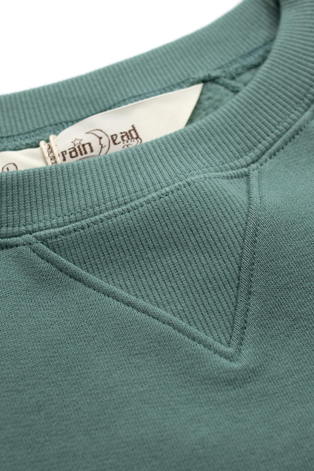 Brain Dead Logo Head Crewneck Grün – Stylischer Raglan-Pullover mit auffälliger Stickerei, lockerer Passform und weichem Tragekomfort.