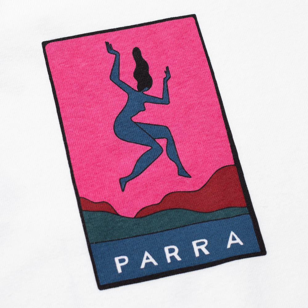 Macro studio view of the left chest graphic on the By Parra Not Listening T-Shirt, capturing the rich contrast of the rectangular pop-art illustration featuring a blue silhouette figure against bright pink and red hills above a navy banner with white "PARRA" typography.