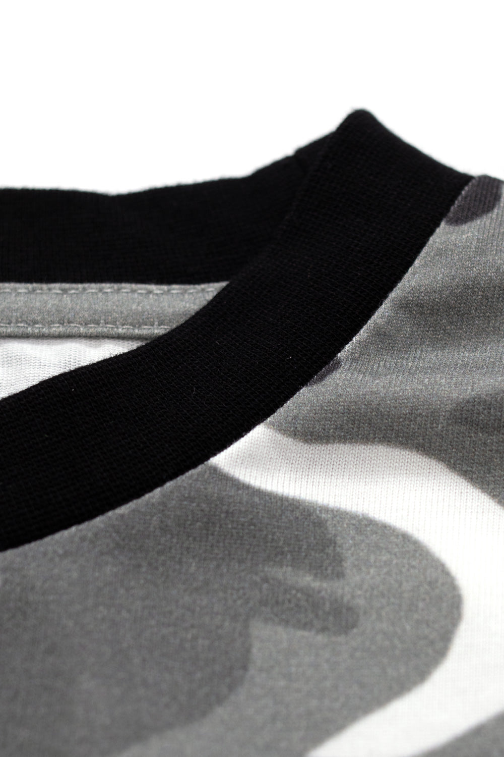 Detail shot of Bye Jeremy Couple Camo Longsleeve Snow Camo neckline with black ribbed collar on premium heavy cotton, emphasizing craftsmanship and Paris-inspired skate fashion.