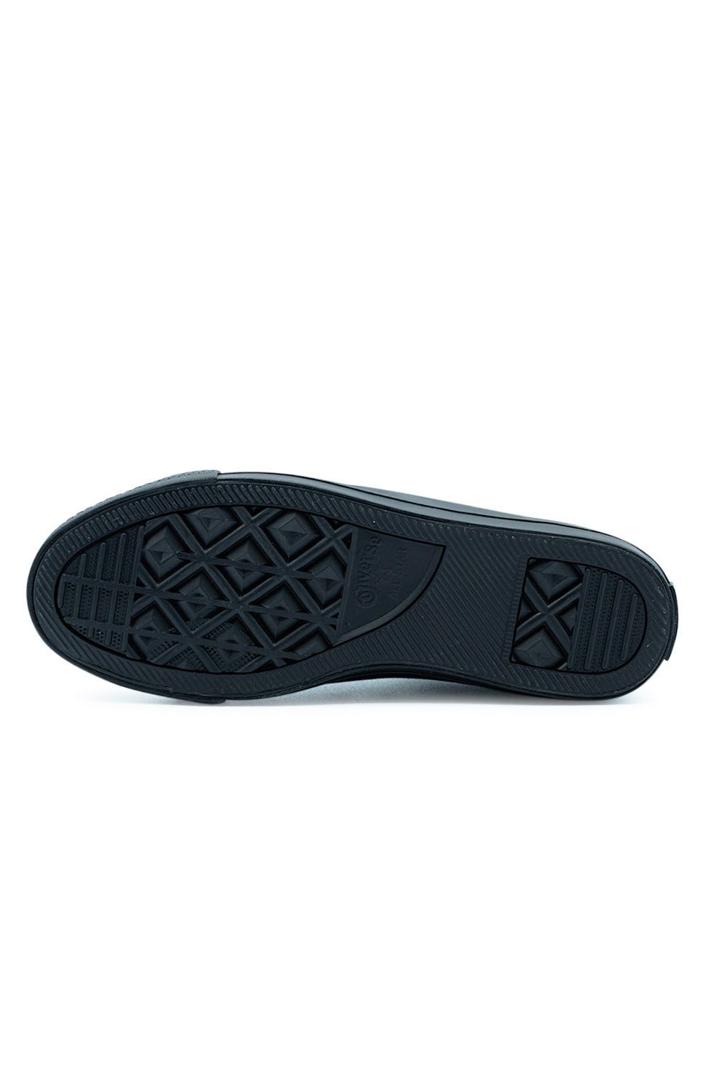 Outsole close-up of the Converse CONS One Star Pro OX Black showing the traction-focused CONS rubber pattern engineered for maximum grip during skateboarding.