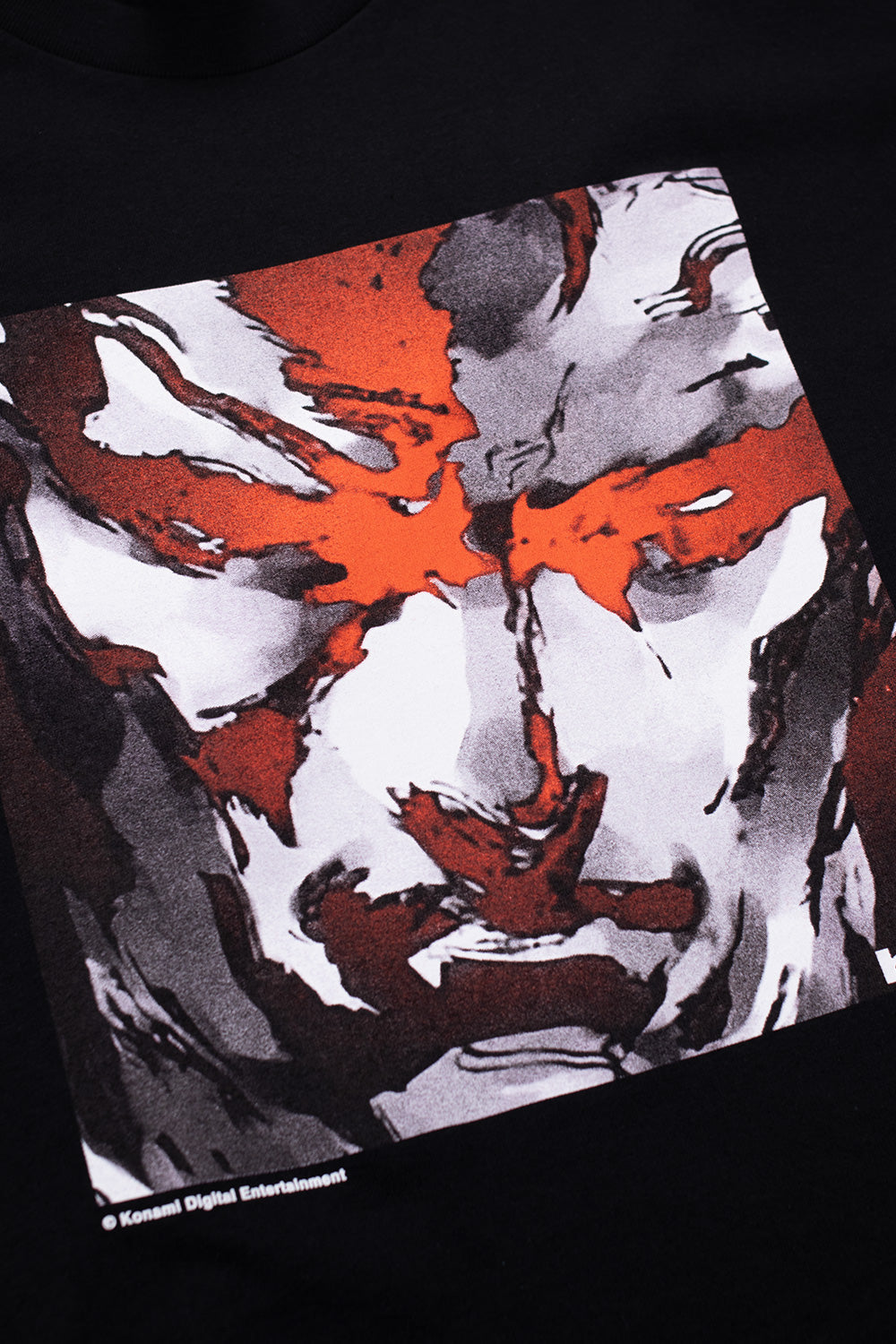 HUF x Metal Gear Solid black T-shirt inspired by original MGS1 Japanese promotional art, printed chest artwork and Metal Gear Solid logo back print, 100% cotton