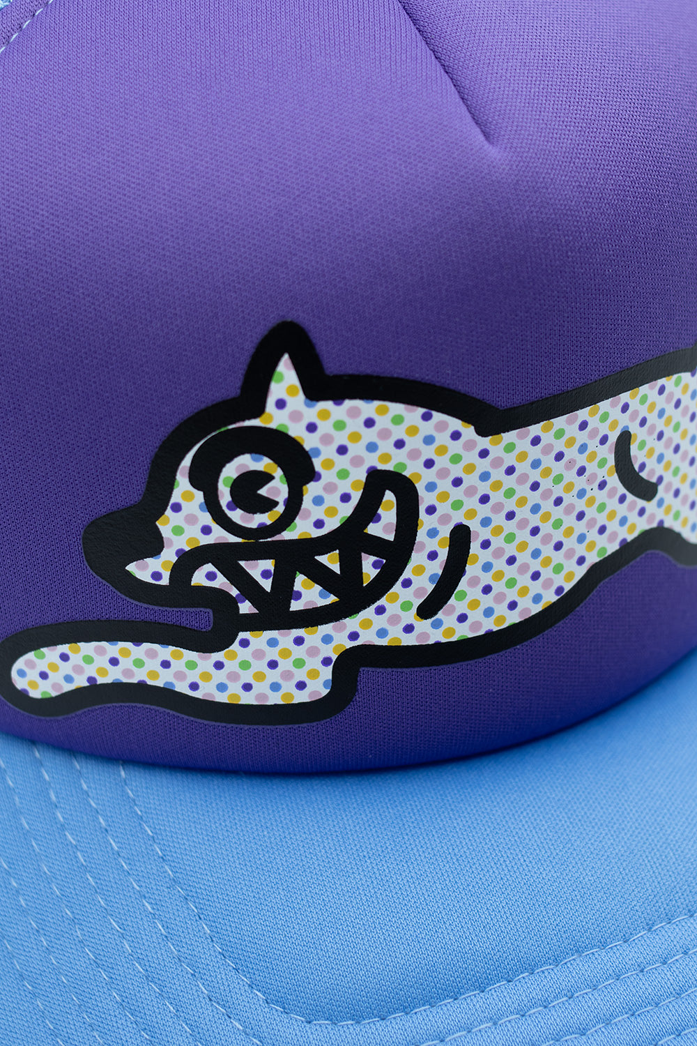 IceCream Trucker Cap lila mit Polka Dot Grafik – Kreatives Design von Pharrell Williams mit Skatewear-Einflüssen.