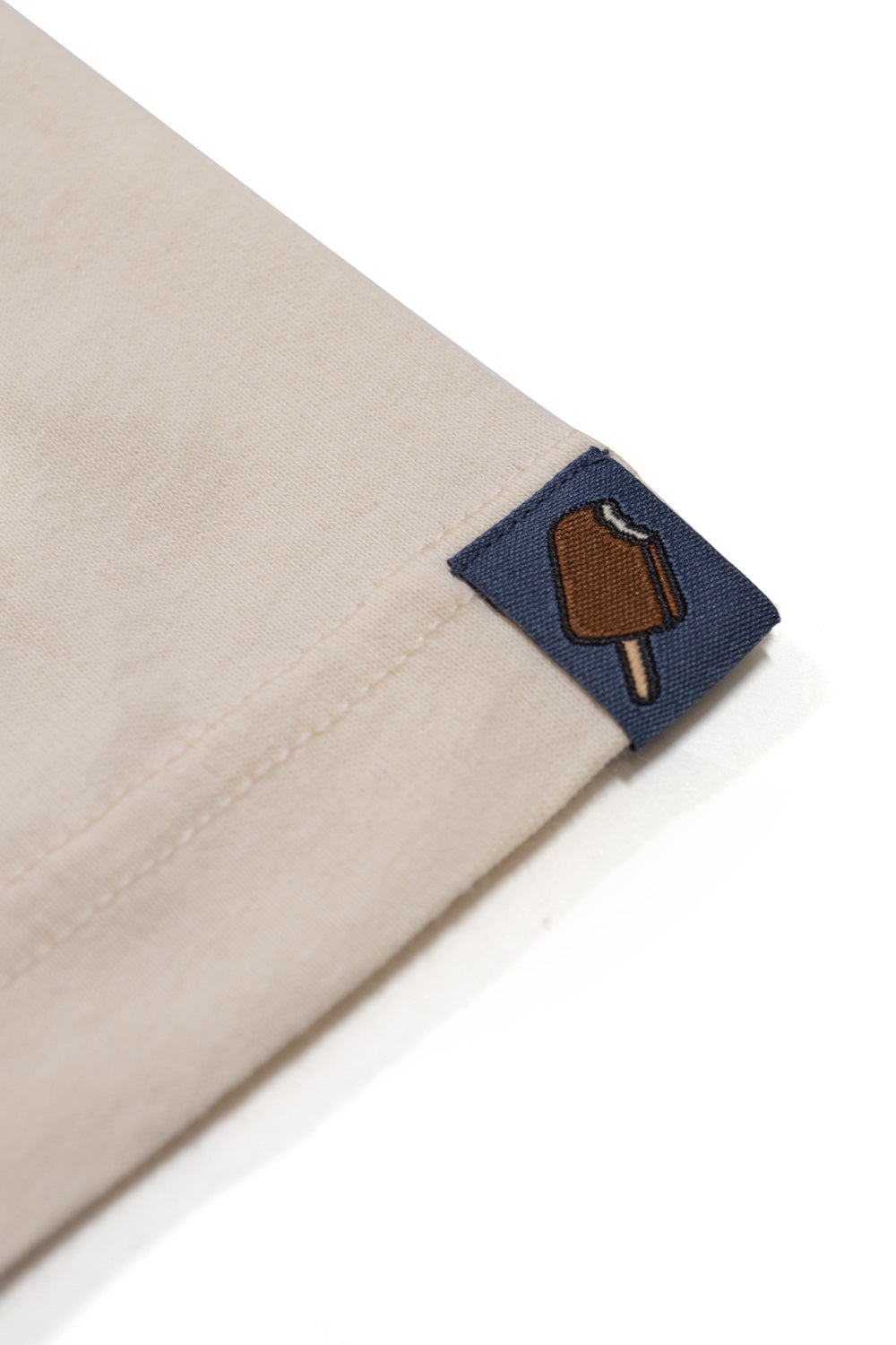 Ice Cream Running Dog long sleeve T-shirt in brown with eye-catching blue design for urban style