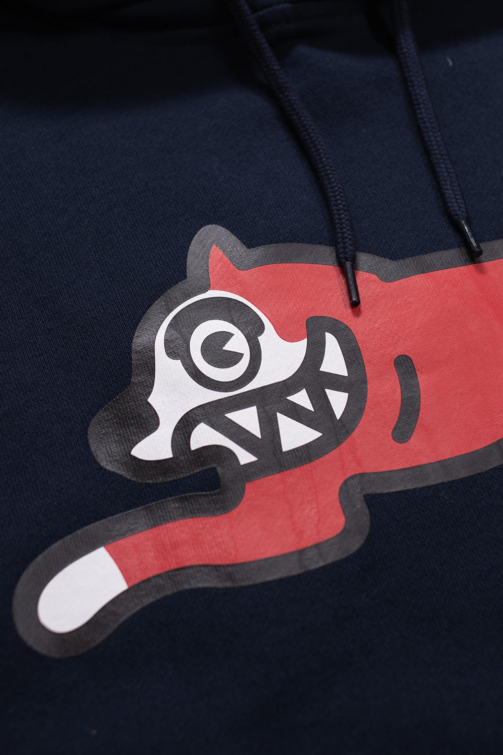 Trendy navy Ice Cream hoodie with bold red Running Dog graphic for urban style