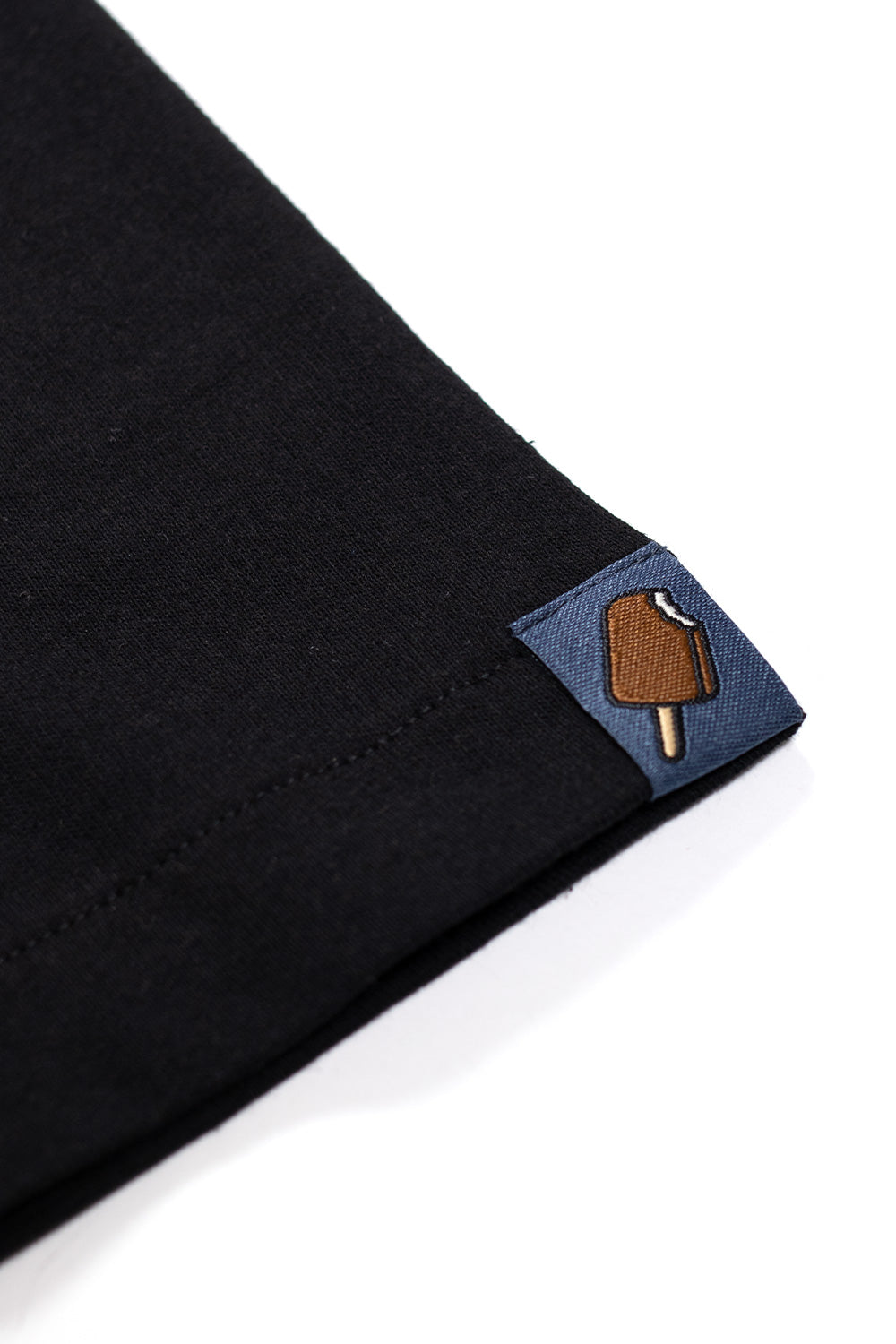 Casual Ice Cream black tee with Running Dog logo for urban streetwear vibes