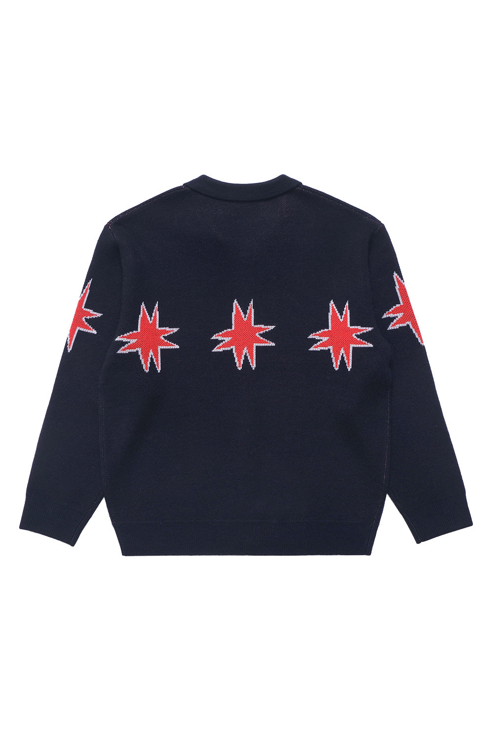 Back view of the Metalwood Studio Kiki Zip Knit long-sleeve polo in navy, showcasing the bold woven red star motifs across the wool-blend knit fabric.