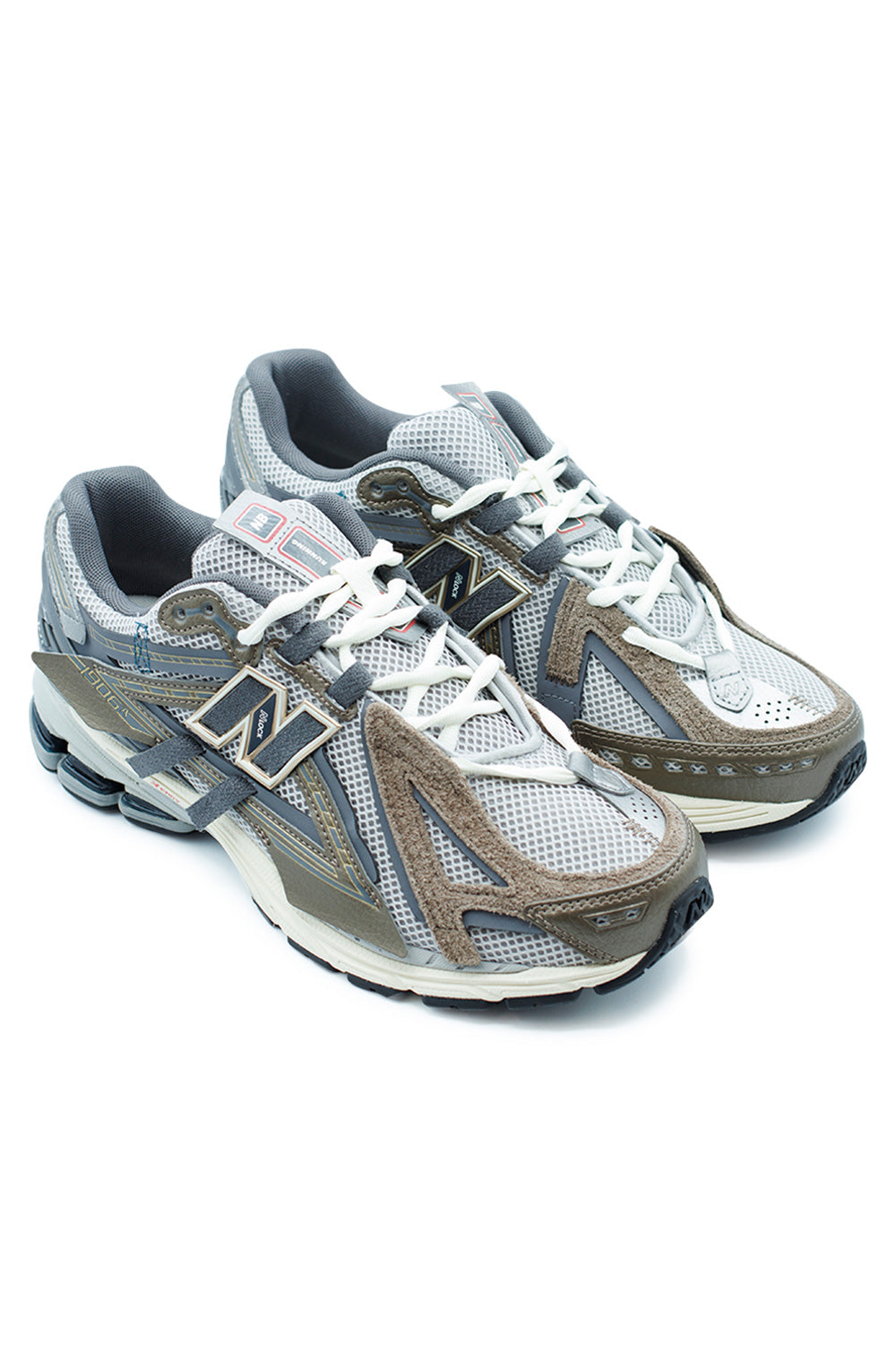 Angled pair of New Balance 1906A Thunder Brown Slate Grey technical runner with layered suede paneling, Y2K-inspired design lines and premium performance sole construction