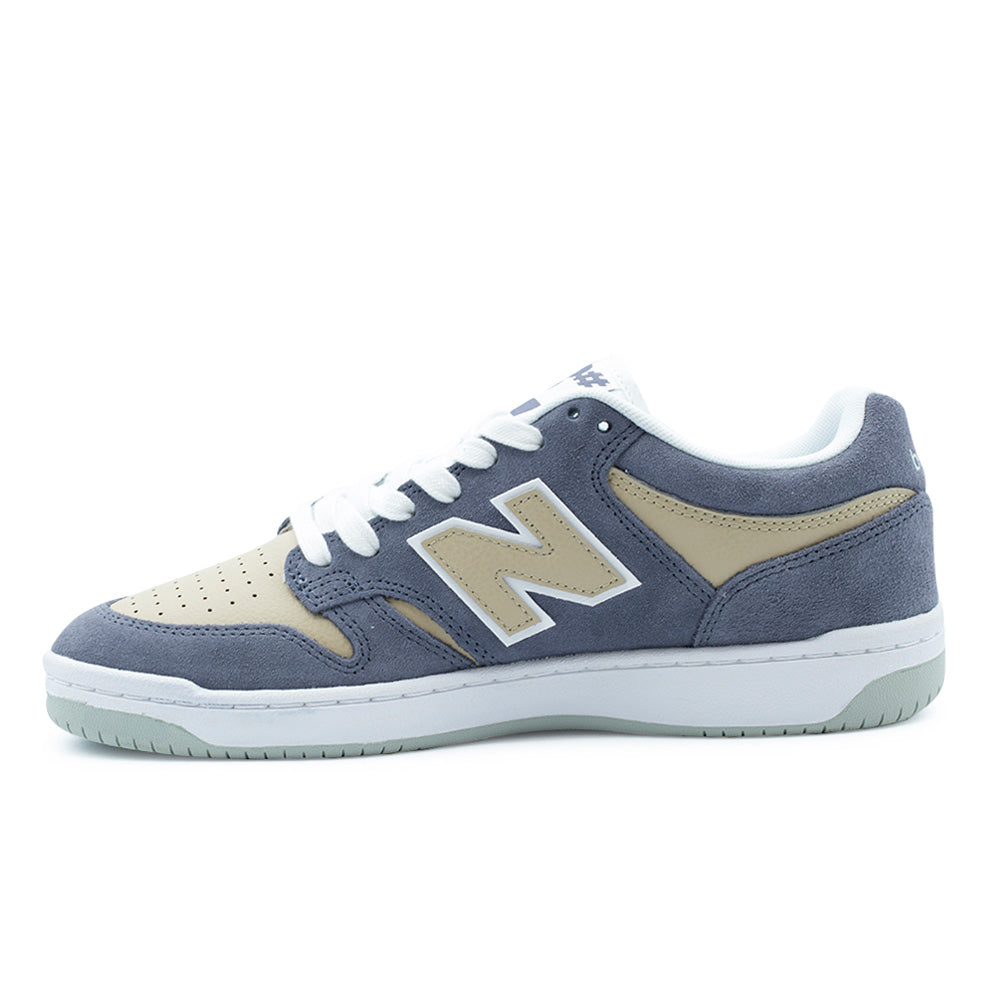 Medial side profile view of the New Balance Numeric 480, highlighting the clean internal arch contour, double-stitched meteorite suede panels, contrasting incense leather inserts, cream leather N logo emblem, and full-length white cupsole midsole housing internal FuelCell foam cushioning.