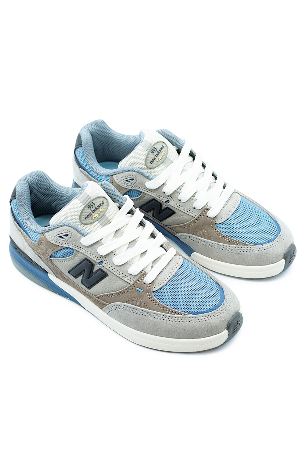 Side view of New Balance Numeric 933 Andrew Reynolds pro model in Mushroom Still Water showing running-inspired silhouette, layered suede construction and supportive ABZORB midsole