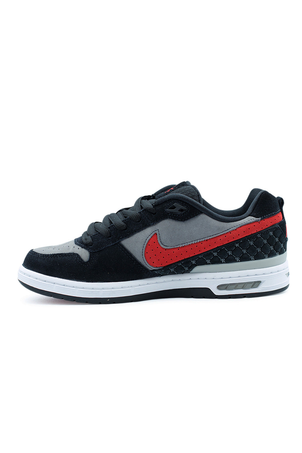 Nike SB Paul Rodriguez Zoom Air Low Shoe – Black Varsity Red Flint Grey reissue with suede nubuck upper, carbon plate outsole, and Zoom Air.