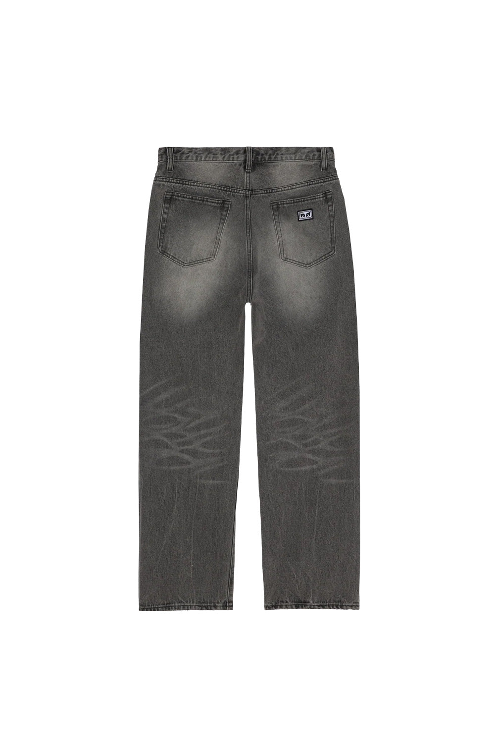 Rear flat lay view of the Obey Boxcar Straight Leg Denim pants in washed Archive Grey, constructed from heavyweight 13.5oz 100% cotton, showcasing a relaxed straight-leg skate cut, fading on the seat and honeycombs behind the knees, and an embroidered black and white Obey Eyes box logo patch stitched on the right rear patch pocket.